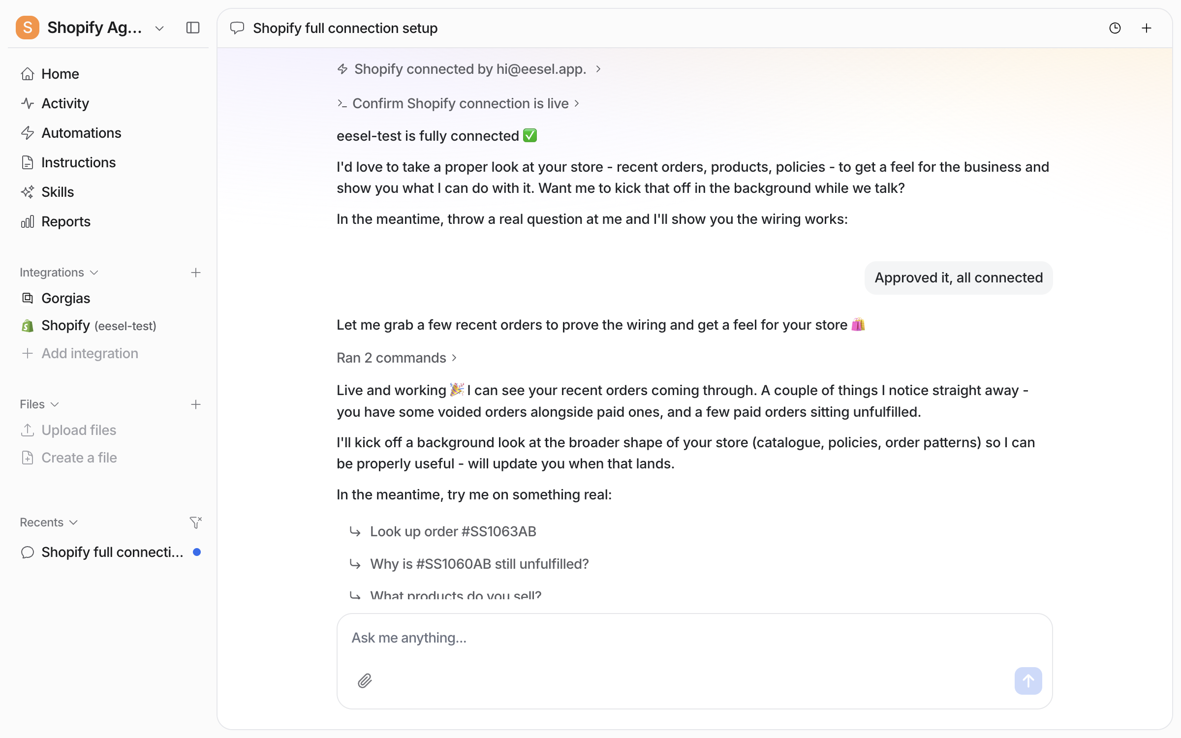 The dashboard chat confirming the Shopify store is connected, reading recent orders to prove the connection, and starting a background read of the store